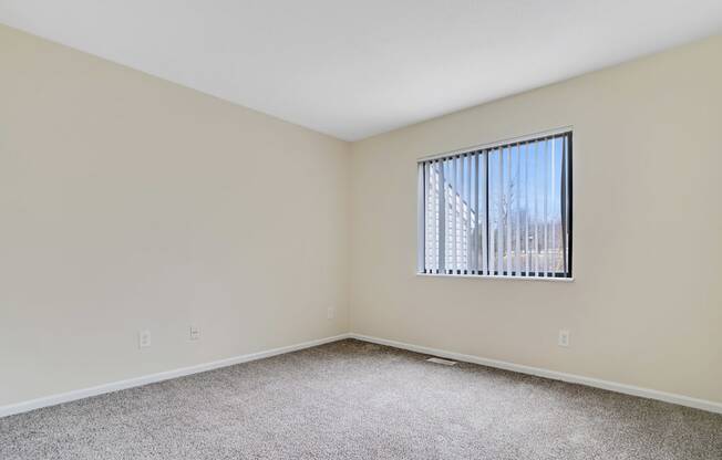 Carpeted Bedroom at Glen at Bogey Hills, St. Charles, MO