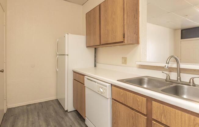 a kitchen with a stove and a sink