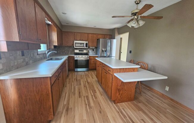 3 bedroom 2 bath with additional lower level family room in great NE location near I380