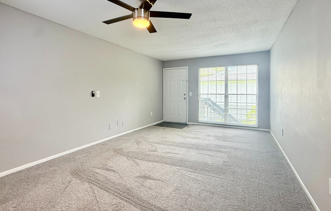 Premium One-Bedroom - Living Room - Carpet Option