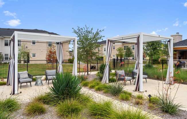 our apartments have a patio with chairs and tables