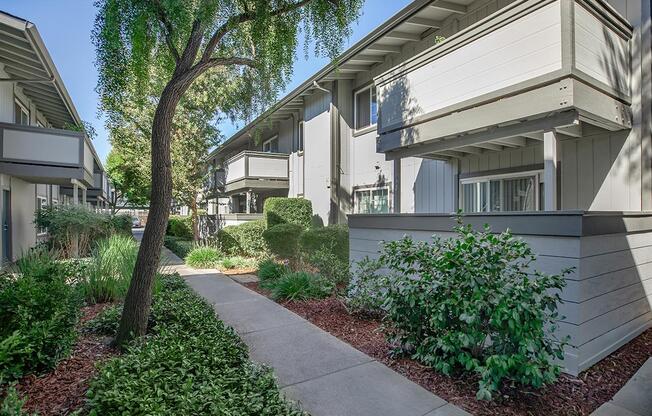 a house that has a sign on the side of a building