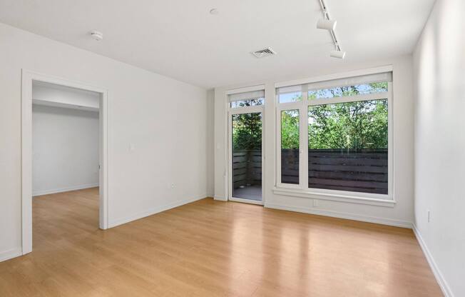 Living room with attached patio at Park77 Apartments, Cambridge, Massachusetts, 02138