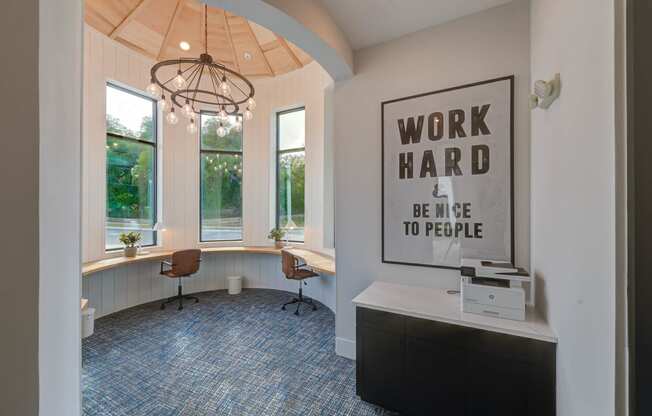 a home office with a poster on the wall and a desk at Legacy at Cibolo, Boerne, TX, 78006