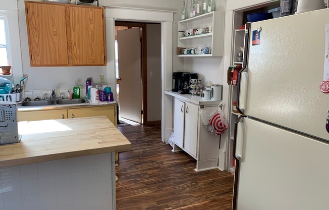 Fenced-in Yard + Washer & Dryer + Off-Street Parking! Available August 1st!