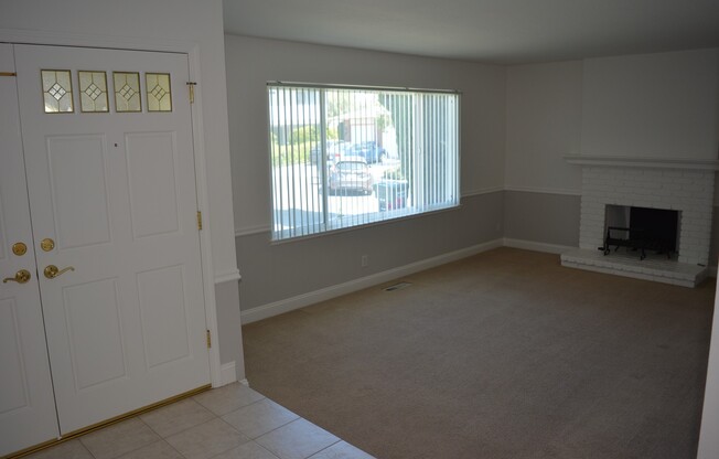 Beautiful Ground Level Front Unit with 2 Car Garage