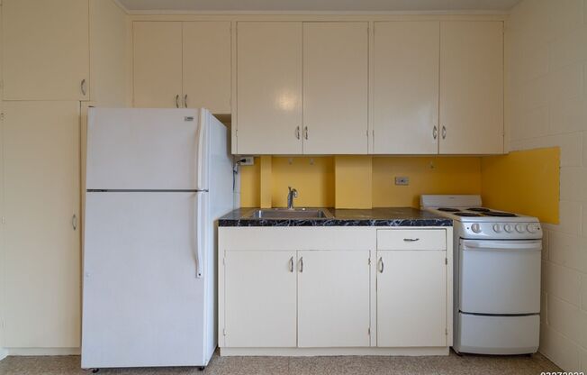 1-bedroom 1-bath Corner Unit with 1 ASSIGNED PARKING, WATER & SEWER INCLUDED!
