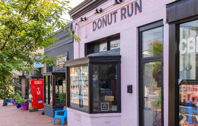 A pink building with the words