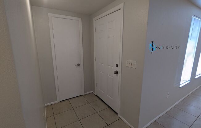 Fresh paint throughout this 3/2/1 1400 Sq. Ft. with fenced yard, tile flooring, HUGE kitchen and indoor laundry with a screen porch!!
