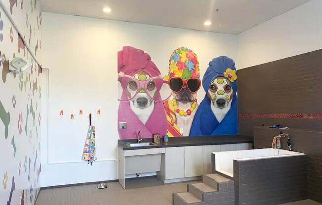 a mural of three dogs wearing hats and sunglasses in a lobby