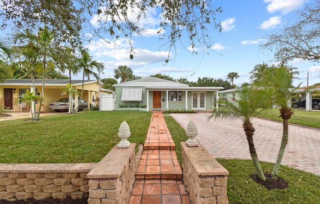 Experience resort-style living in this beautifully maintained 3-bedroom, 2-bath home just one block from Summa Beach in West Palm.