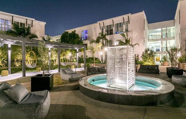 the pool and fountain at night