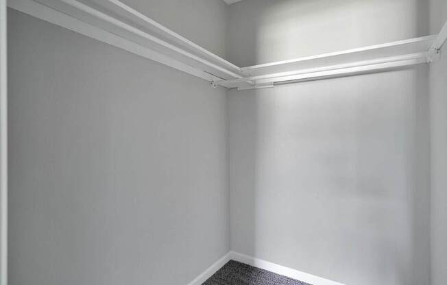 A white wall with a white ceiling and a white floor.
