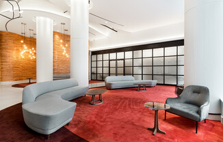 Bright and modern luxury apartment lobby located in Midtown West at The Max apartments. Lobby is bri