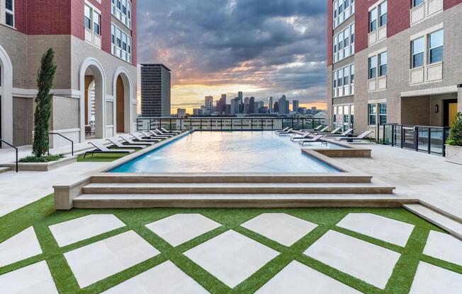 Take in the amazing view of the Houston skyline at the Arbor resort-style pool with cabanas.