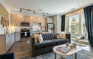 Model living room and kitchen at The Dartmouth North Hills Apartments, Raleigh, 27609