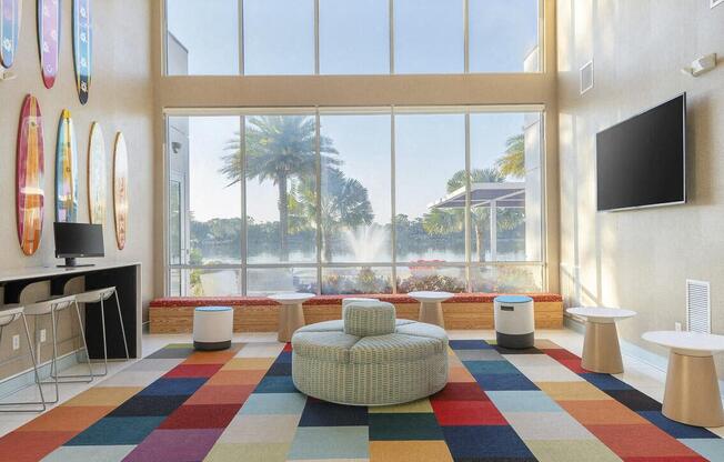 a room with a view of a water fountain and a large window at Lakeside Villas, Orlando, 32817
