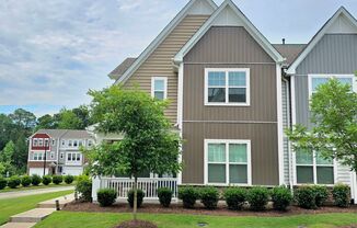 3 Bedroom 2.5 Bathroom End Unit Townhome w/ 1st Floor Owners Suite and a 2 car Garage in the heart of Brier Creek