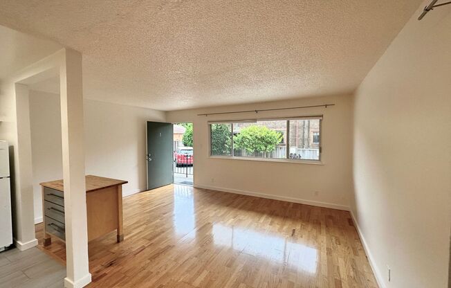 Spacious and Sunlit 2-Bedroom 1-Bath apartment with hardwood floors, private balcony, near Ashby BART
