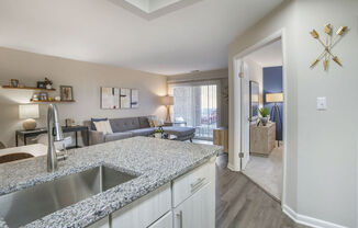 Renovated kitchen and living room at Elme Manassas, Manassas