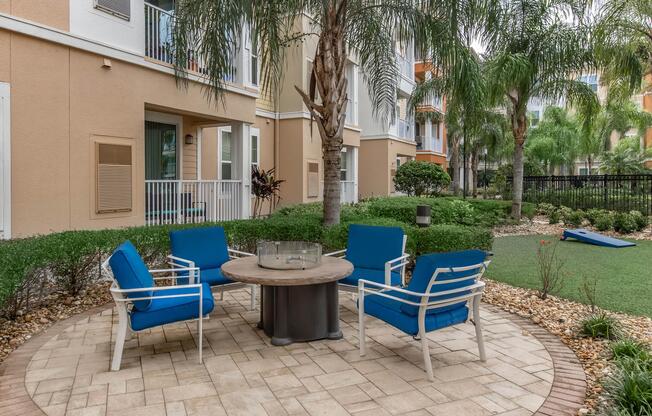 a blue bench in front of a house