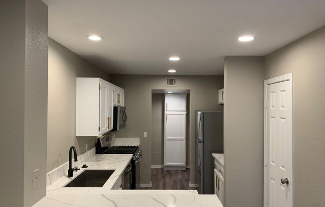 STUNNING REMODELED TOWNHOME — YOUR NEXT HOME JUST FOUND YOU!