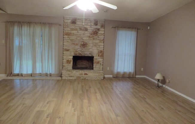 Established one story 3/2/2 on tree covered lot!