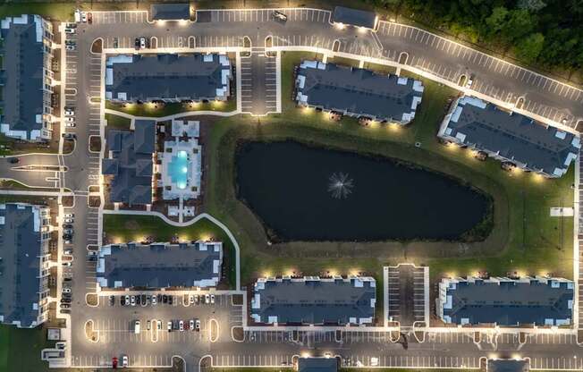 A large complex with a lake in the middle.