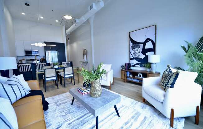 a living room with couches and a coffee table