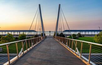 A stunning pedestrian bridge leads you straight to Revere Beach, where sunrise strolls and ocean views become part of your daily rhythm.
