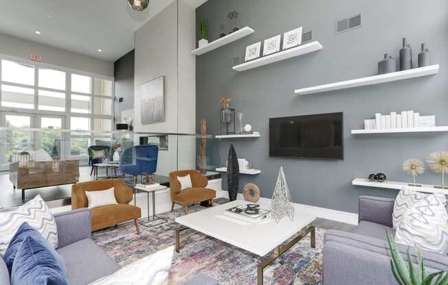 a living room with gray walls and a white coffee table