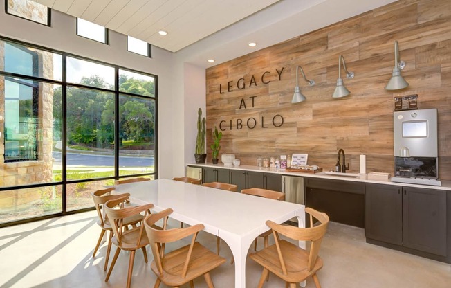 a dining room with a white table and chairs at Legacy at Cibolo, Texas