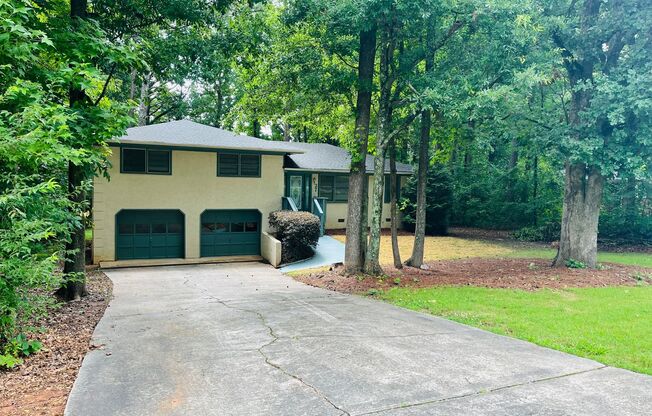 Prime Newnan location, newly renovated, private and wooded lot, 2 car garage, must see!