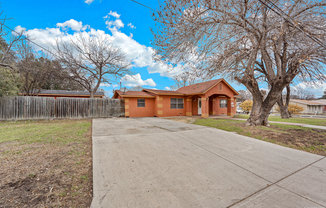3323 W WOODLAWN AVE