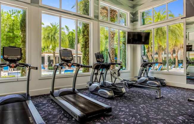 Sancerre at Sand Lake apartments fitness center with cardio equipment