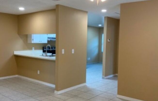 Updated 2/2 End Unit near UC-New Floors & Appliances, Laundry Hookups Inside