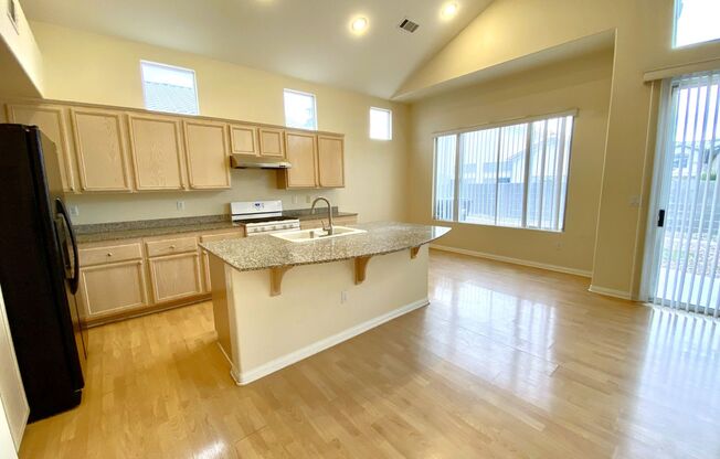 Perfect family home in Rhodes Ranch guard gated golf course community with a full bedroom and bathroom on the first floor!