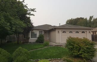 SINGLE FAMILY HOME WITH HUGE FENCED IN YARD