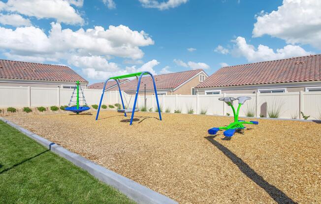 a group of people on a beach with a kite