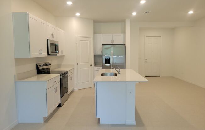 Brand NEW 3 Bed/2.5 Bath Townhome that was constructed just this year! Lawn & Internet INCLUDED in rent!