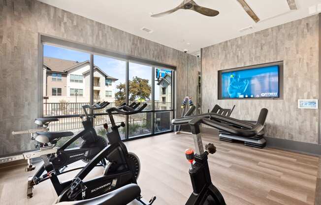 workout room at ironridge at hill country village apartments