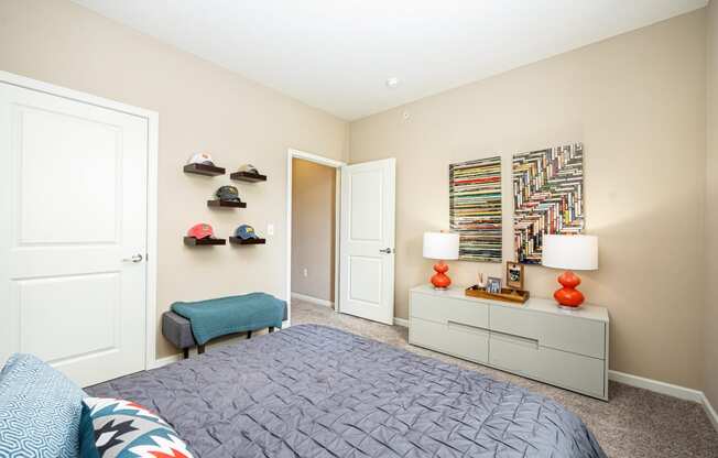 a bedroom with a bed and a closet