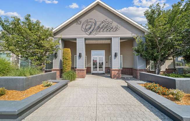 The entrance to a building with a sign that reads "Crestwood".