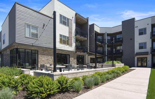 a view of the building from the outside at The Flats at Riverwoods, Provo