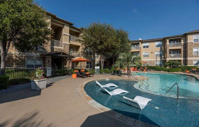 Lounging By The Pool at Woodbridge Villas Apartments, Texas, 75048
