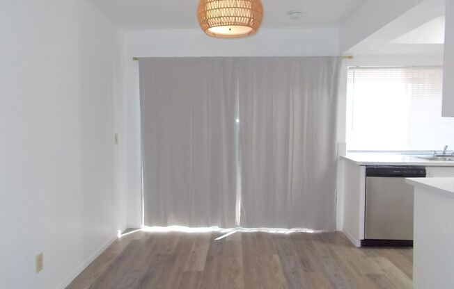 Charming Upstairs Condo with Private Balcony