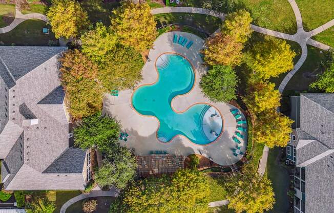 a birds eye view of the pool at the resort at governors island