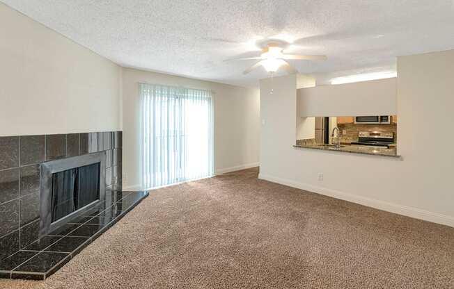 This is a photo of the living room in the 982 square foot 1 bedroom, 1 bath apartment at Cambridge Court Apartments in Dallas, TX.
