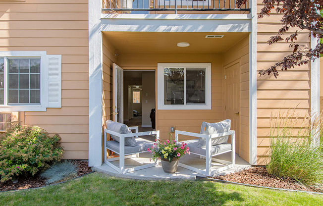 two rocking chairs on a porch of a home  at Quail Springs, West Richland, Washington