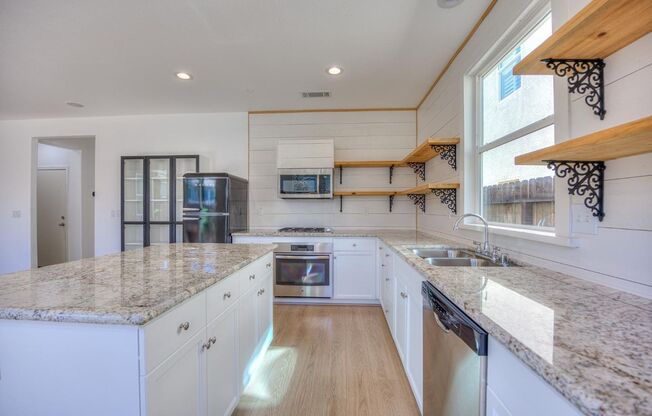 Spacious 3-Bedroom Home with a Backyard in Harlan Ranch Community!